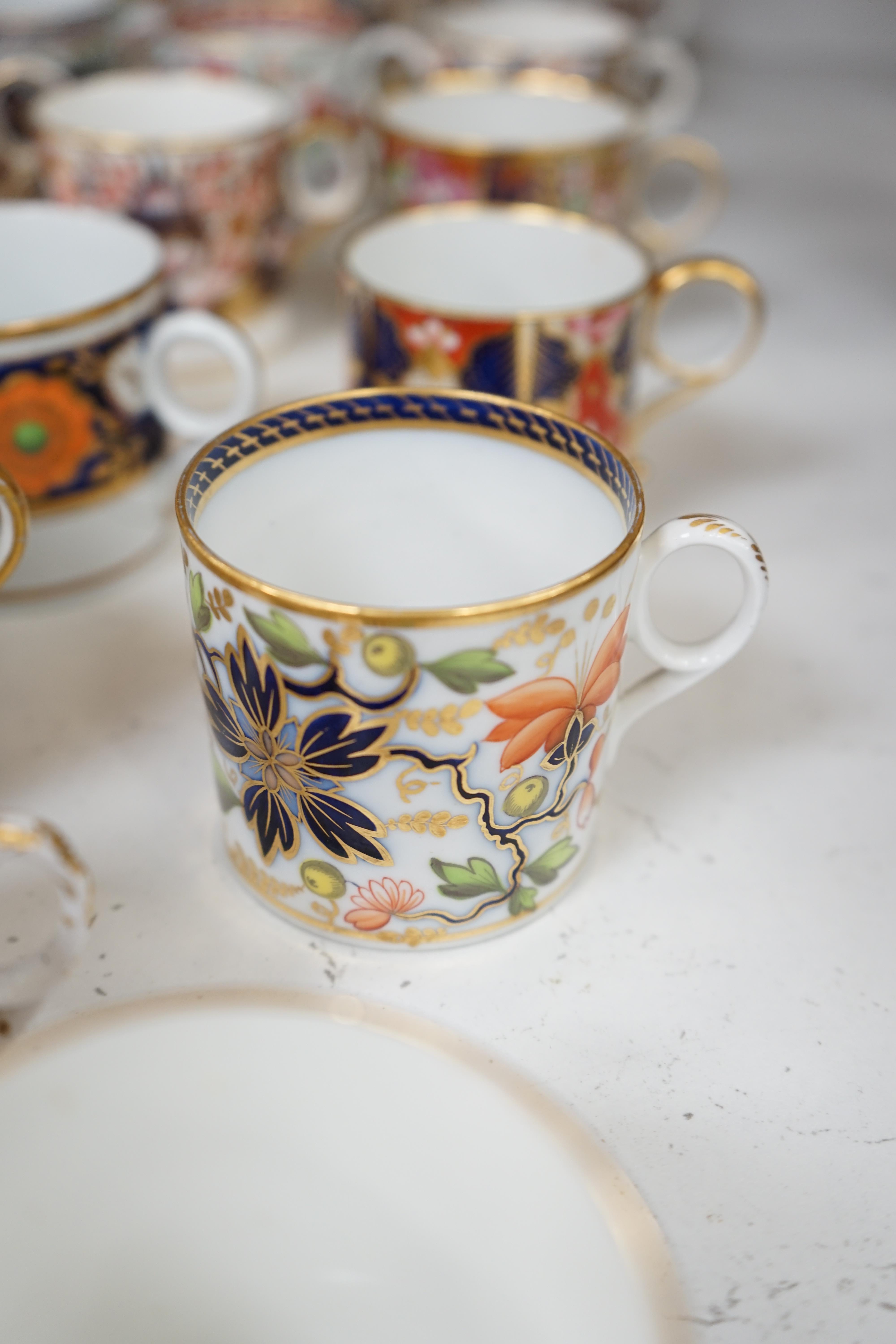 Twelve mixed 1800-1820 English porcelain Imari patterned coffee cans
